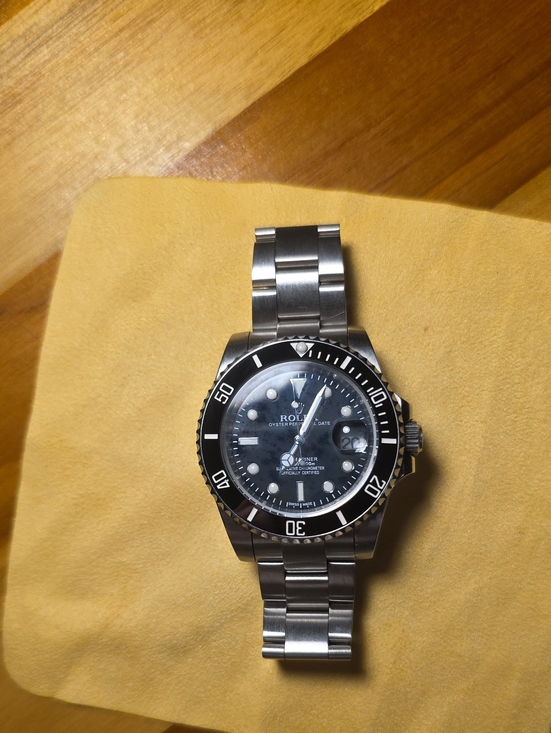 Rolex Other - Rolex Stainless Steel Watch with Black Dial and Bezel (Inauthentic)